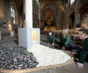 Photo copyright: Richard Hanson (0793 908 1208)Pupils from Ripon Cathedral CE Primary School, visiting 'Six million +', an art installation to commemorate the Holocaust, in Ripon Cathedral.  The pupils had helped collect some of the over six million buttons that make up the installation, which was produced by artist Antonia Stowe.l to r: Owen Foster, Joanna Magrs, Katie Chandler (all year 6).Commissioned by Keval at TES design desk.20.01.10Press release follows:6 million +, Every person counts, is a artwork of 6 million buttons, each one representing someone killed in the Holocaust and it will be mounted at the Cathedral from January 13th until February 20th. The Ã+Ã refers to Jewish and non-Jewish individuals who were not counted and the millions who have died across the world in genocides since the Second World War, and children from local schools have been collecting buttons to add to the exhibition.The installation was originally designed by Leeds based artist Antonia Stowe who was commissioned to work with the Kirklees Museums & Galleries.